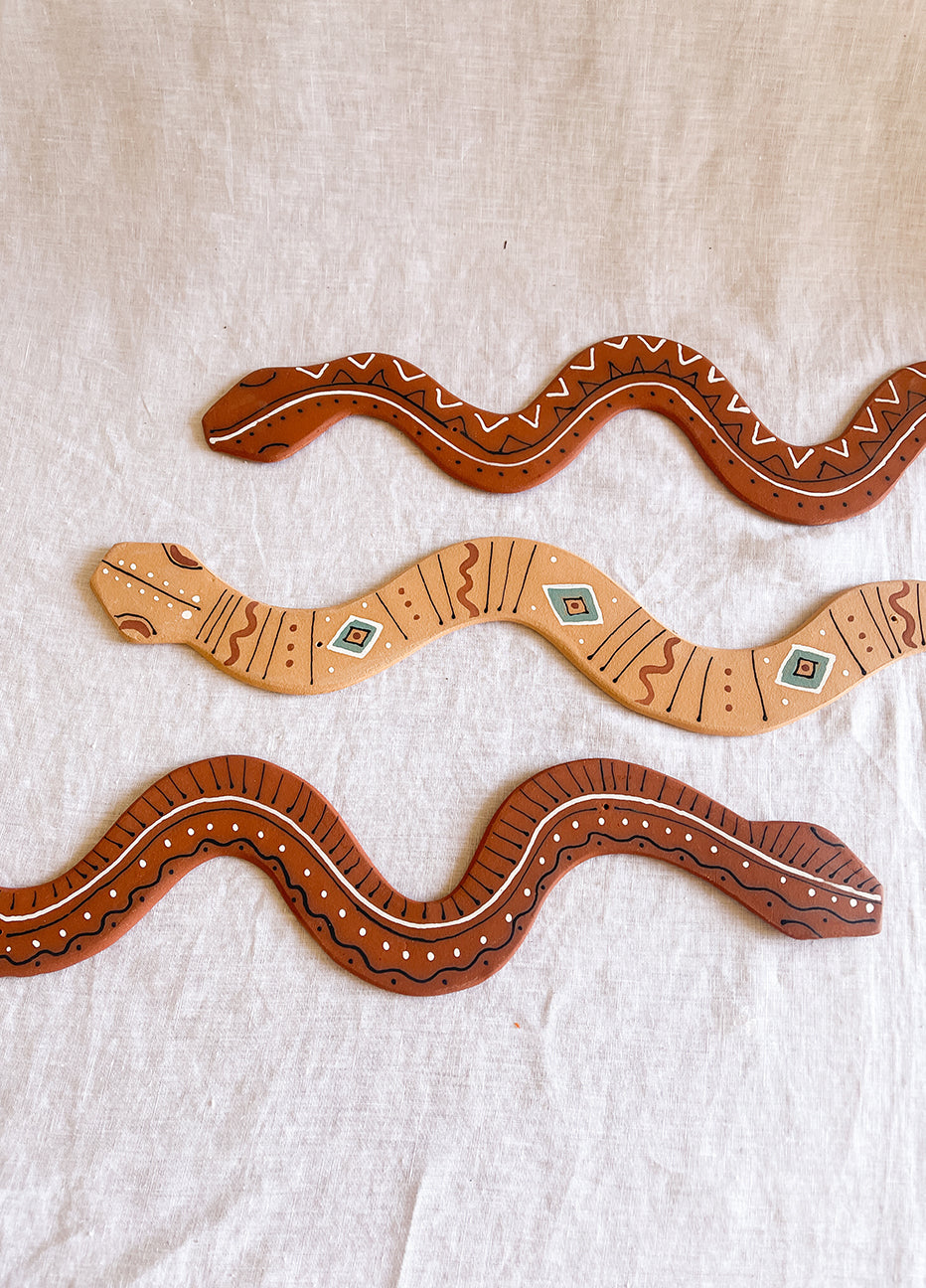 Kelsey Melville Wall Snakes